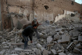 Dozens die in strikes on Syrian school district, other areas